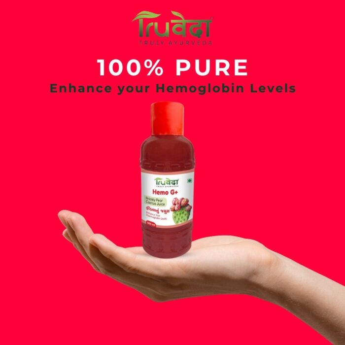 Hand holding Truveda Hemo G+ bottle with label promoting 100% pure findla juice to enhance hemoglobin