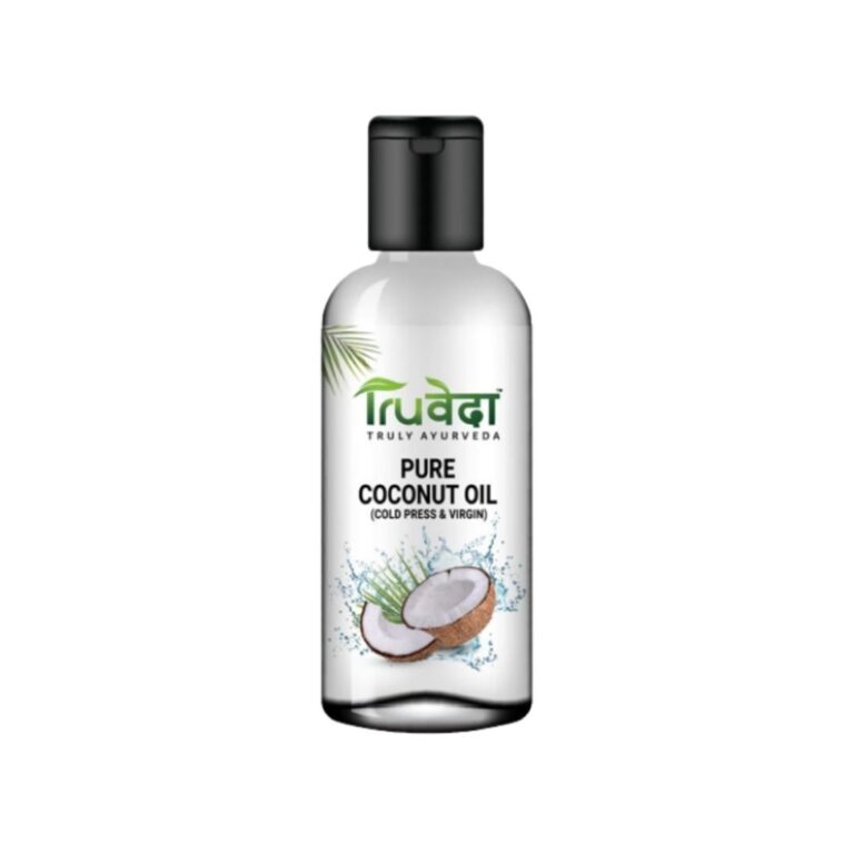 ottle of TruVeda pure cold-pressed virgin coconut oil placed beside halved coconuts, highlighting its natural and organic formulation for hair, skin, and holistic health benefits