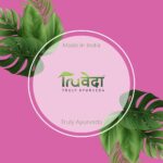 Truveda Truly Ayurveda logo with tropical leaf background, highlighting Indian-made Ayurvedic essential oils